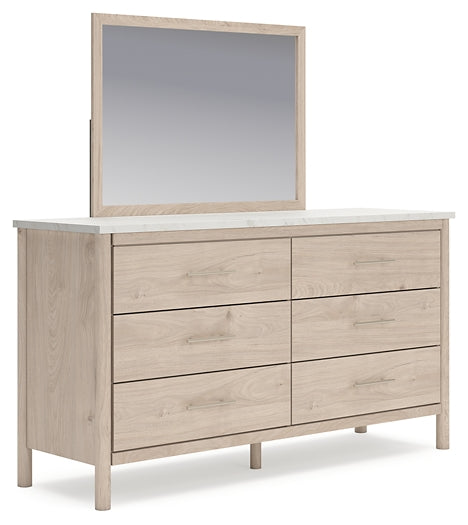 Cadmori Queen Upholstered Panel Bed with Mirrored Dresser