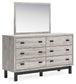 Vessalli Queen Panel Headboard with Mirrored Dresser and Chest